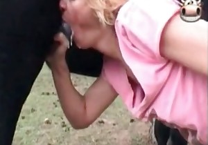 Black pony cums in her wide-opened mouth