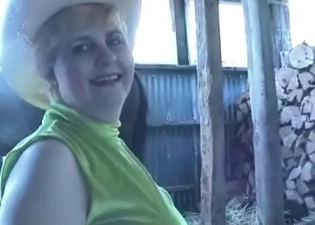 Dog fucks a fat-ass farmer MILF in a barn
