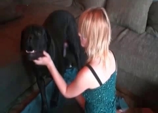 Blond-haired chick fucks a horny dog