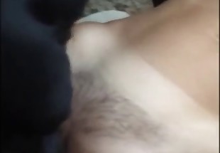 Cute black dog slowly licks her wide-opened wet cunt