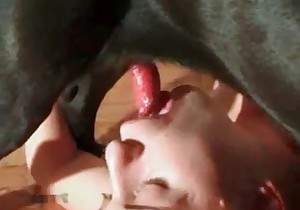 Dirty hooker is squeezing cum out of a dog