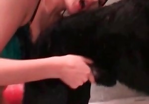 Asian zoo slut is sucking a dog cock