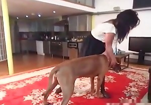 Sexy slut is getting her cunt licked by a dog